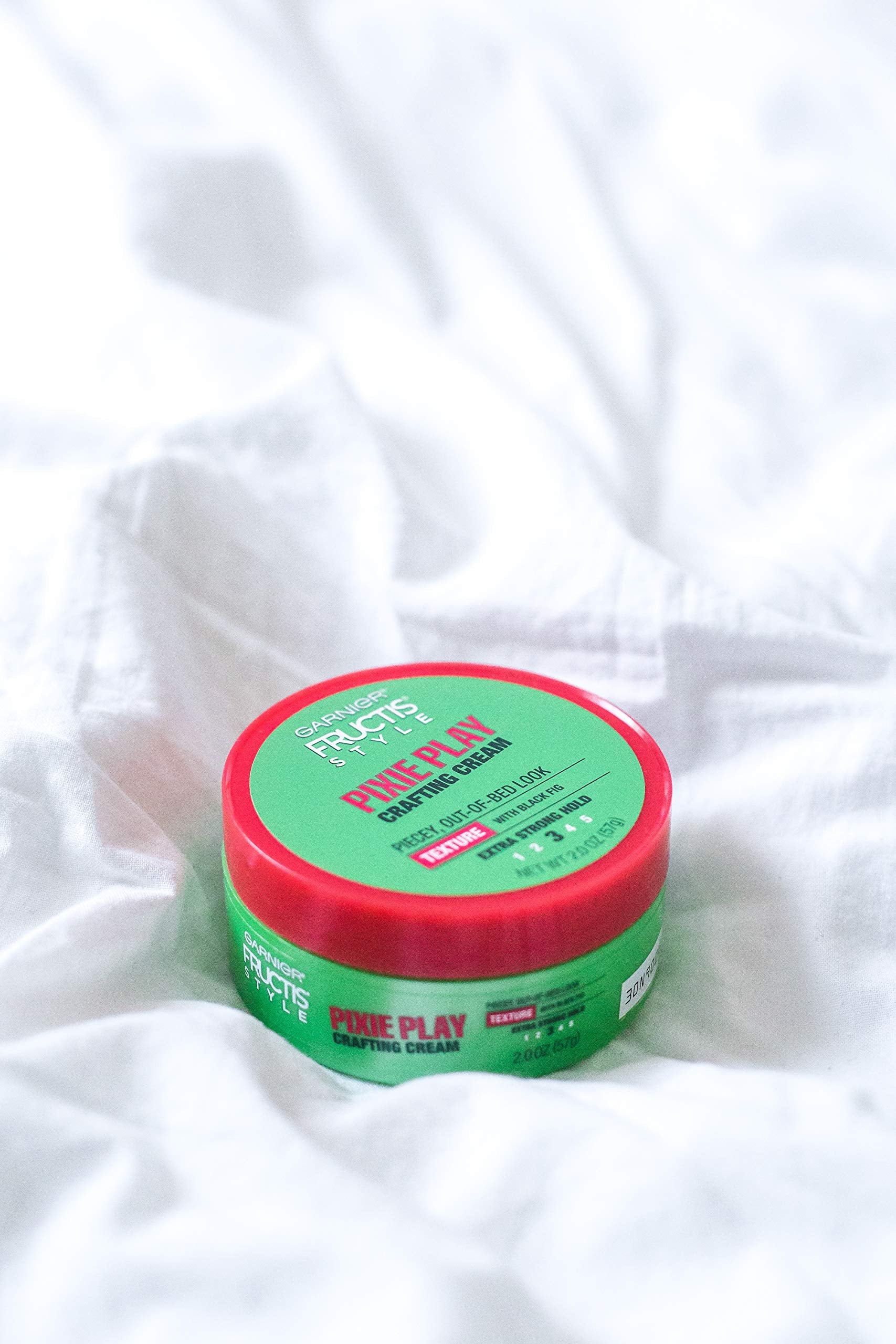 Garnier Fructis Pixie Play Crafting Cream adds texture and body for everyday looks.