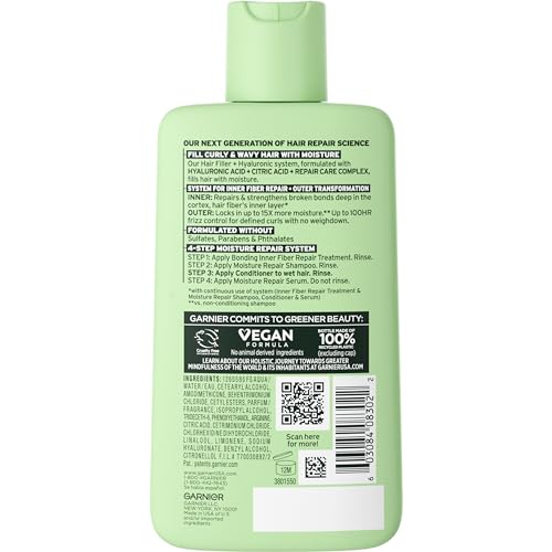 Garnier Fructis Relleno Capilar: aplicador distribuyendo producto en cabello húmedo