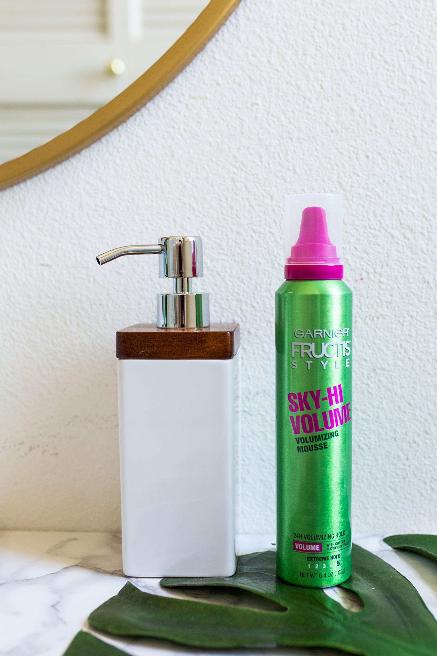 Garnier Fructis Sky High Volume Mousse on hair delivering dramatic volume