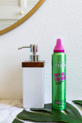 Garnier Fructis Sky High Volume Mousse on hair delivering dramatic volume
