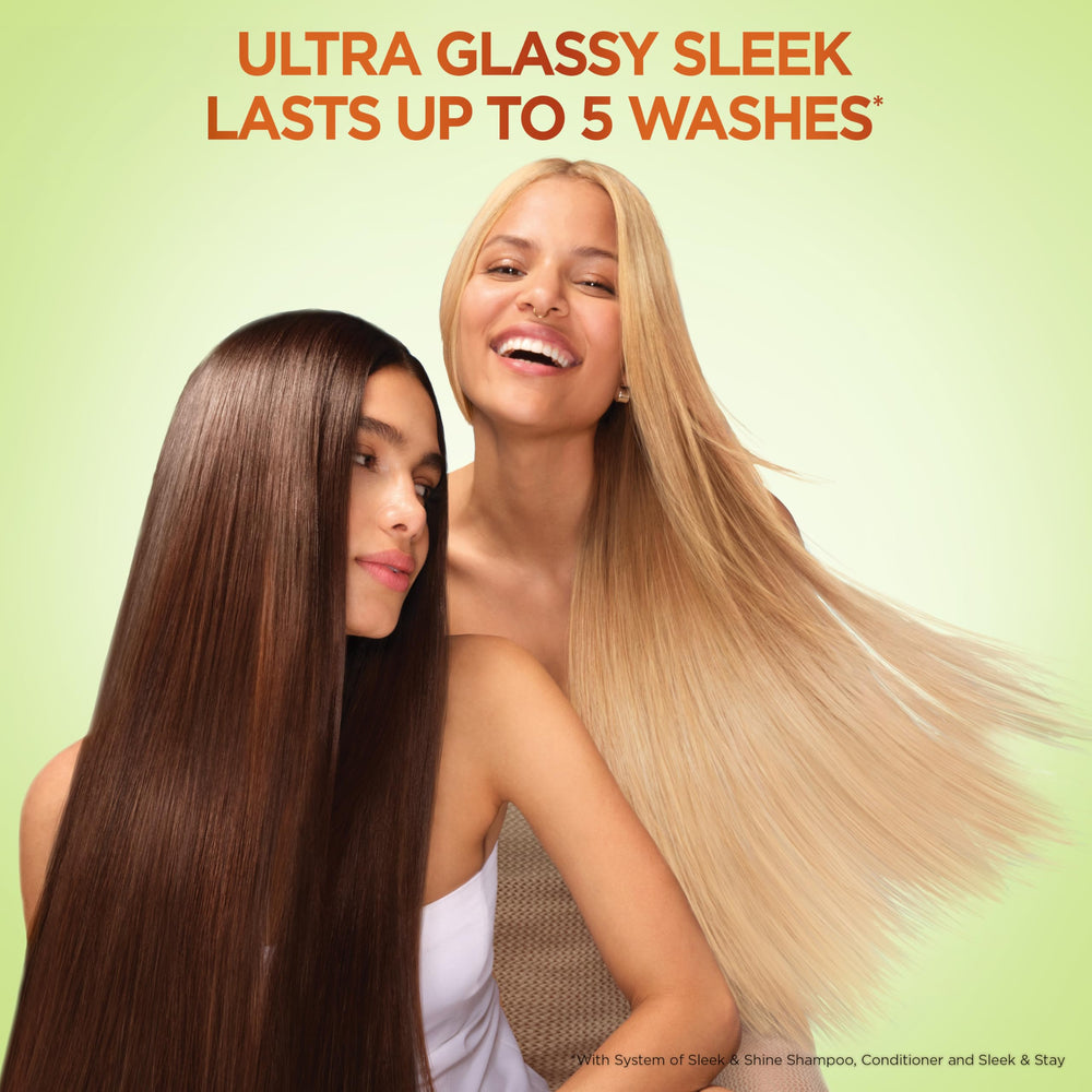 Garnier Fructis Sleek & Shine bathroom scene on shelf after shower.