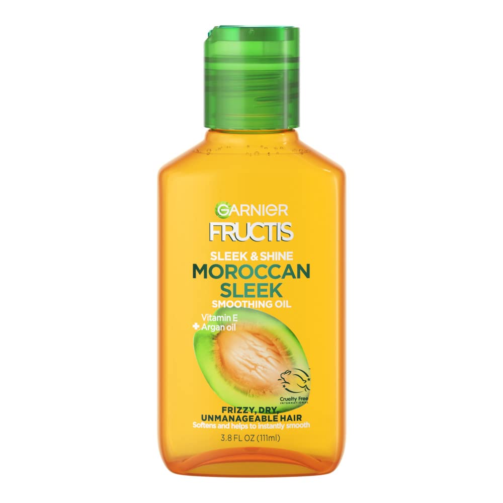 Garnier Fructis Sleek & Shine Moroccan Sleek Oil pour demonstrates instant sleekness and frizz control.
