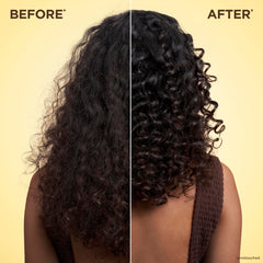 Garnier Honey Water conditioner being applied for smoothing and moisture.