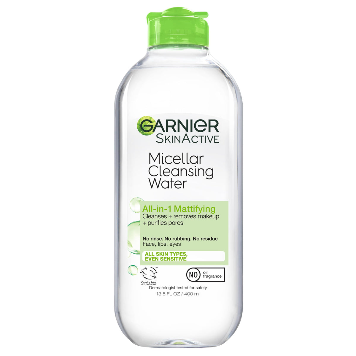 Garnier Micellar Water bottle pouring for quick all-in-one cleansing.