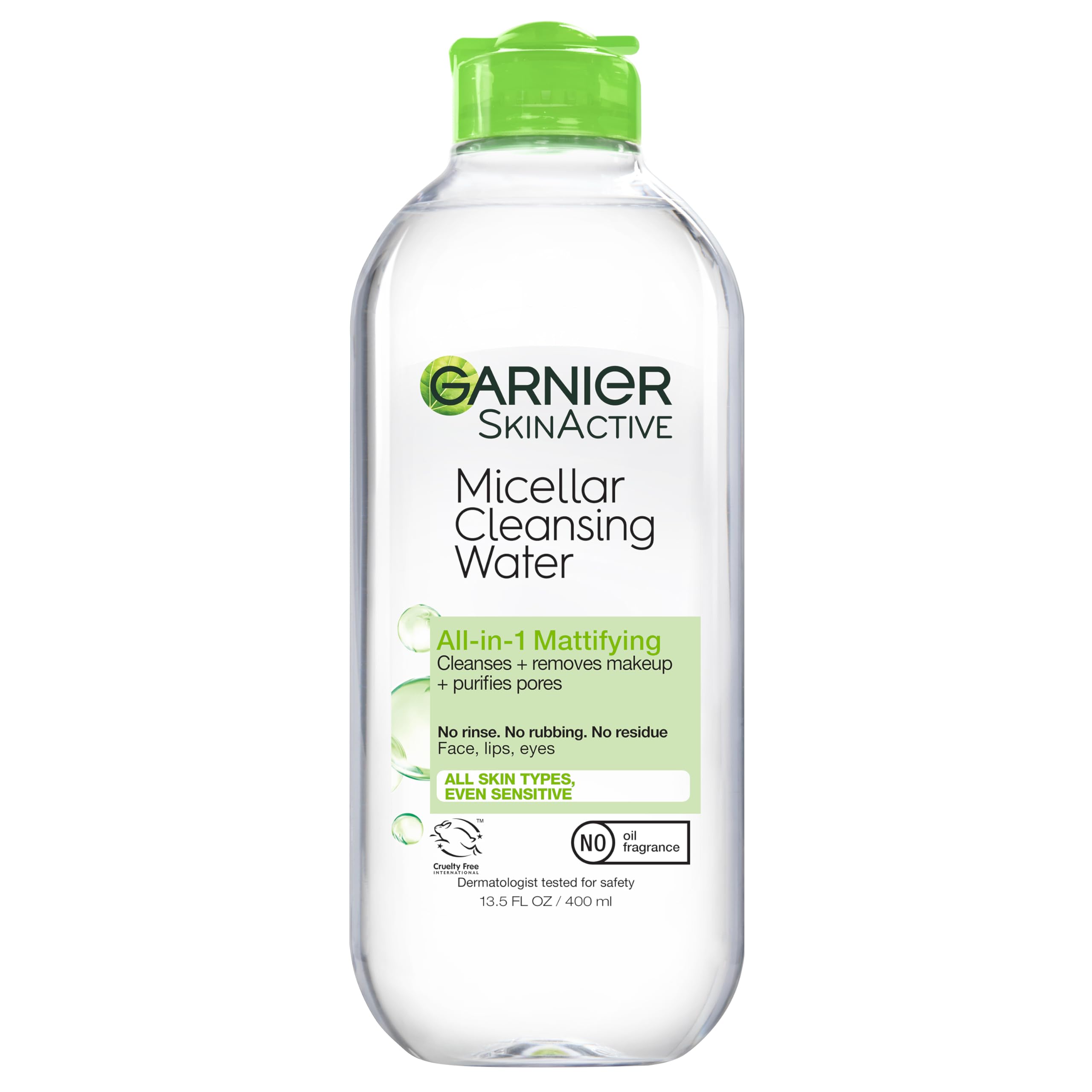 Garnier Micellar Water bottle pouring for quick all-in-one cleansing.