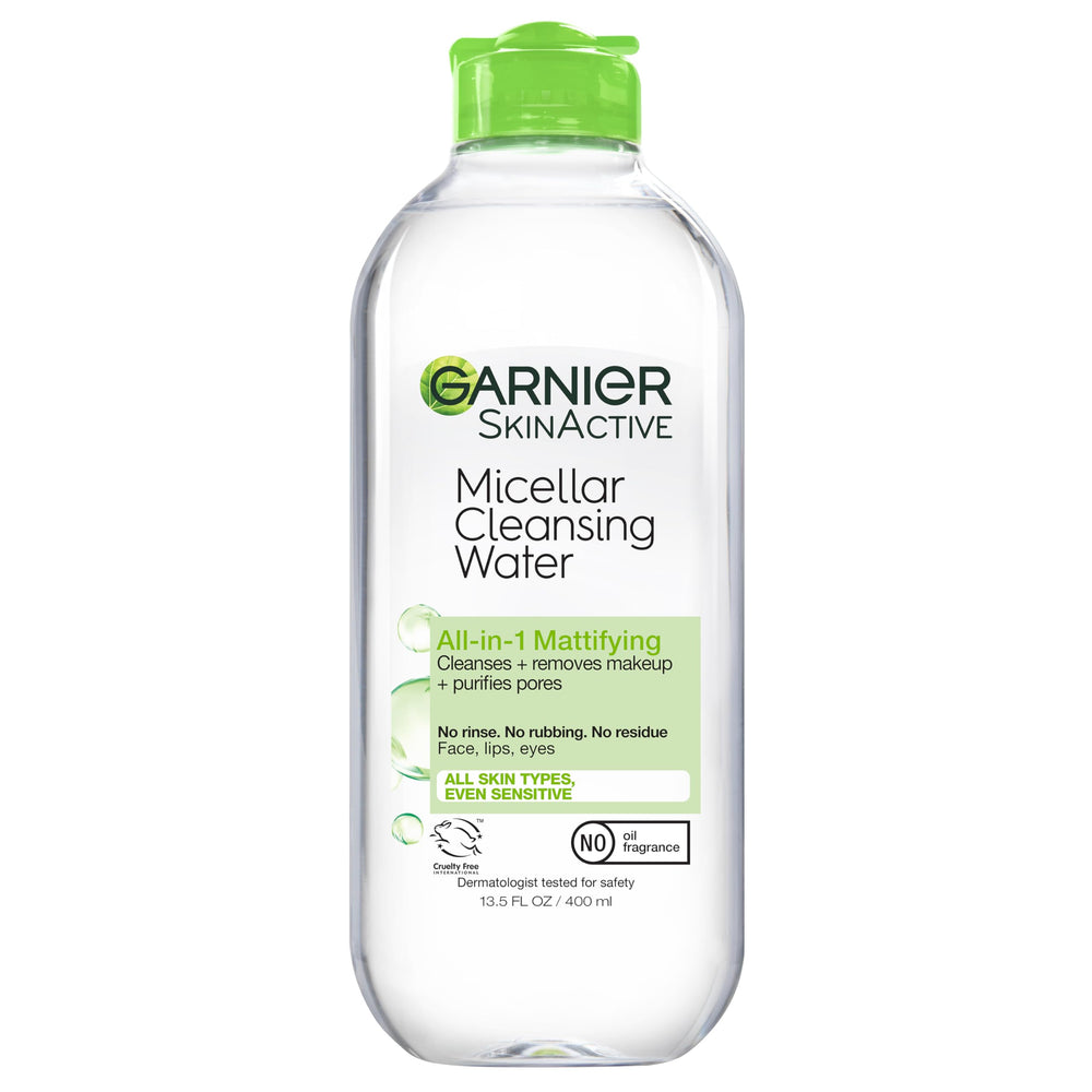Garnier Micellar Water bottle pouring for quick all-in-one cleansing.