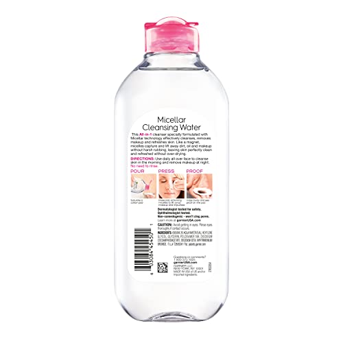 Garnier Micellar Water cotton pad removes makeup without rubbing for gentle cleansing.