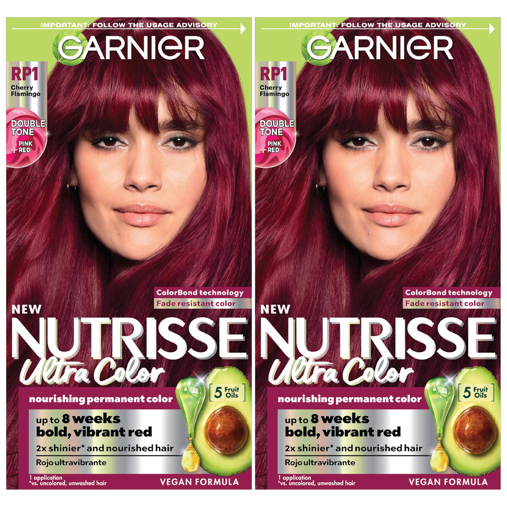 Garnier Nutrisse Ultra Color bottle pour demonstrates easy color mixing for bold, lasting shade.