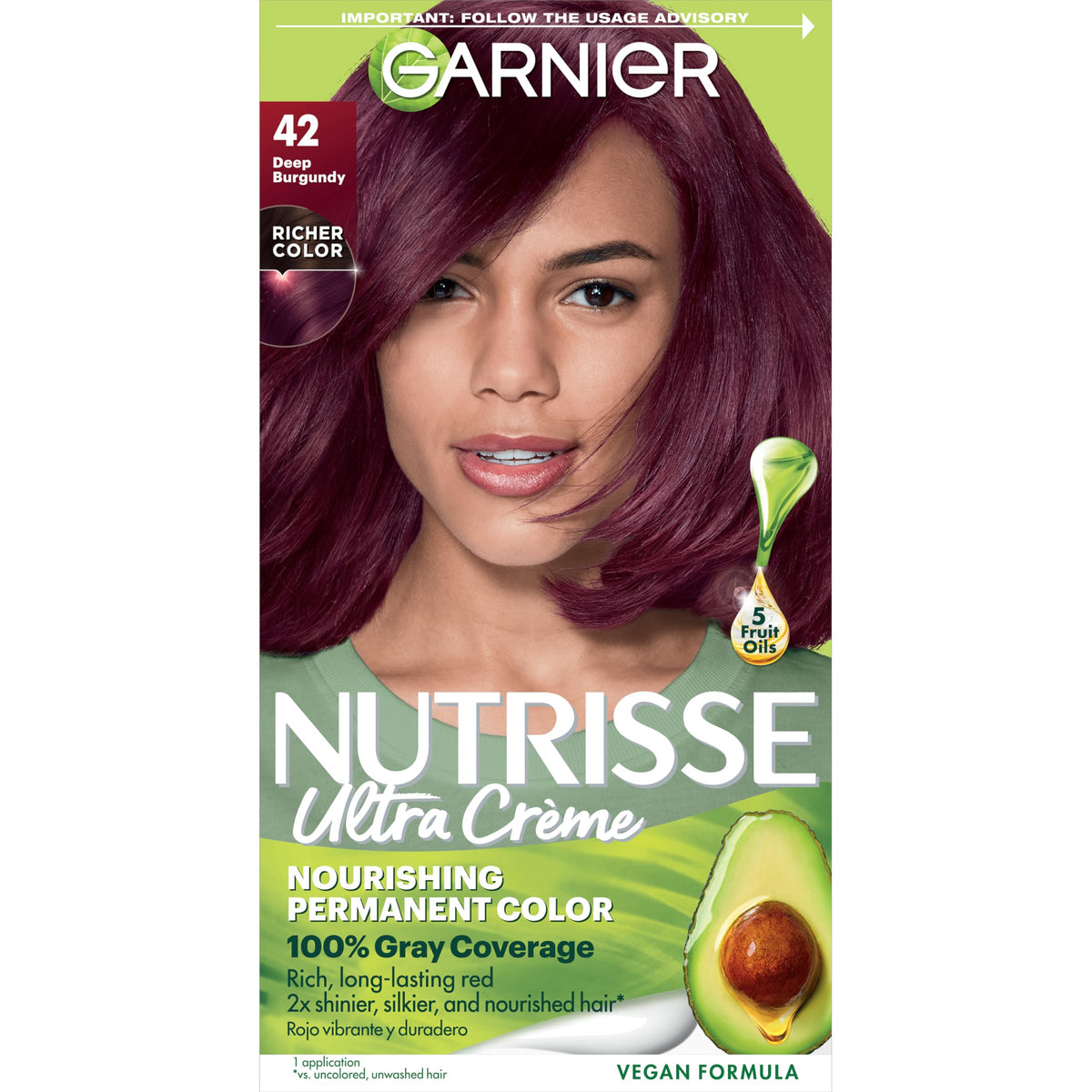 Garnier Nutrisse Ultra Creme bottle close-up shows nourishing oils for color preparation