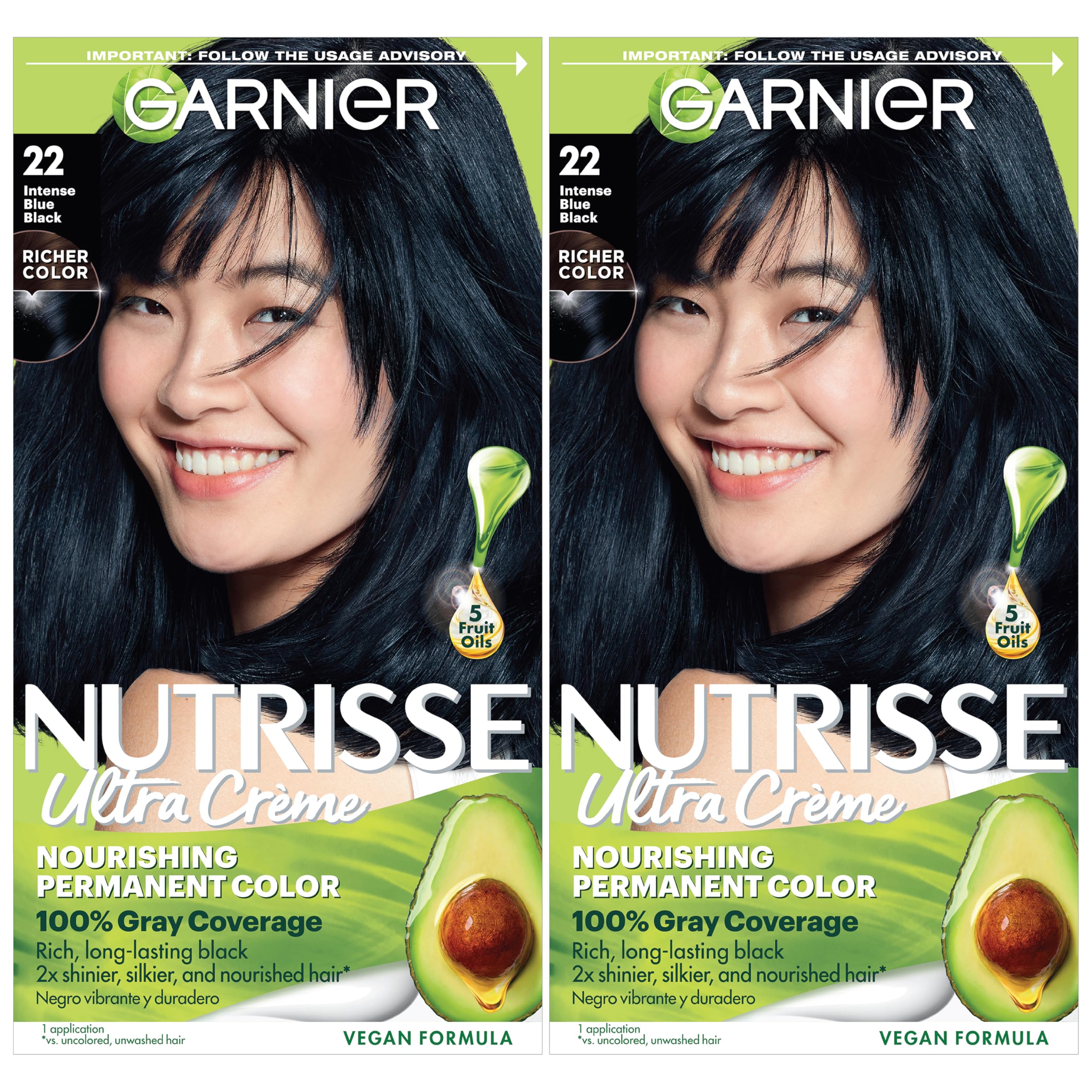 Garnier Nutrisse Ultra Creme colorant bottle in blue-black shade for vibrant, long-lasting color.