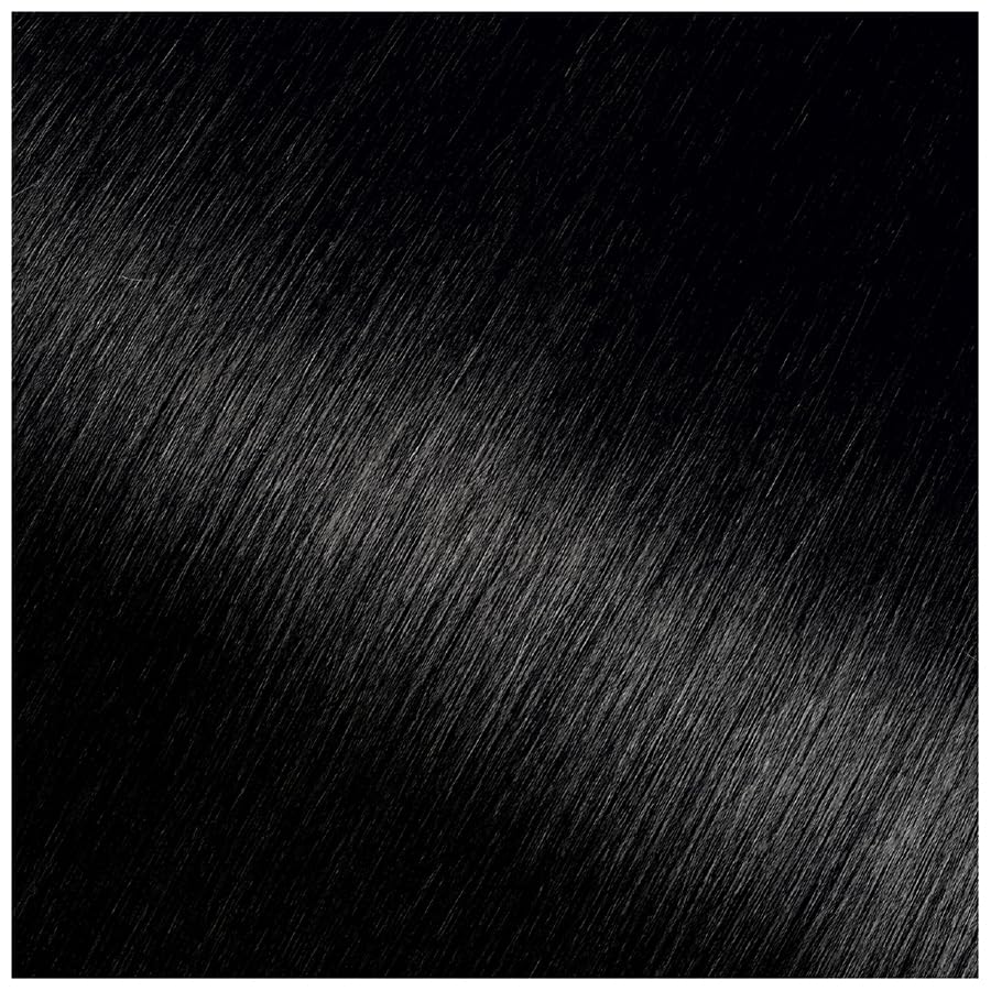 Garnier Olia colorant and developer blending shot demonstrates even color results.