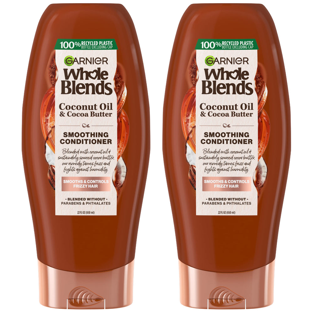 Garnier Whole Blends botella con aceite de coco y cacao para suavidad y aroma exótico