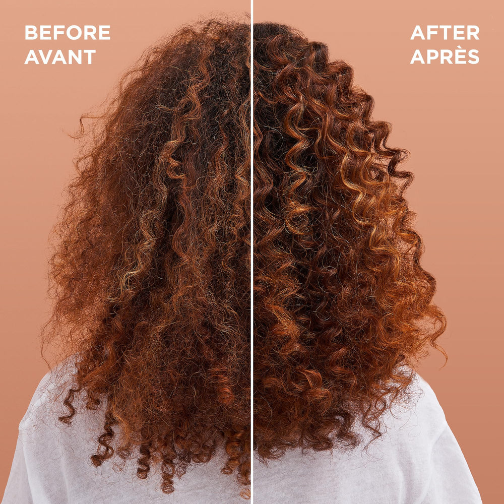 Garnier Whole Blends Aceite combate frizz en cabello encrespado.