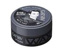 Gatsby wax in hand shows smooth application for natural movement.