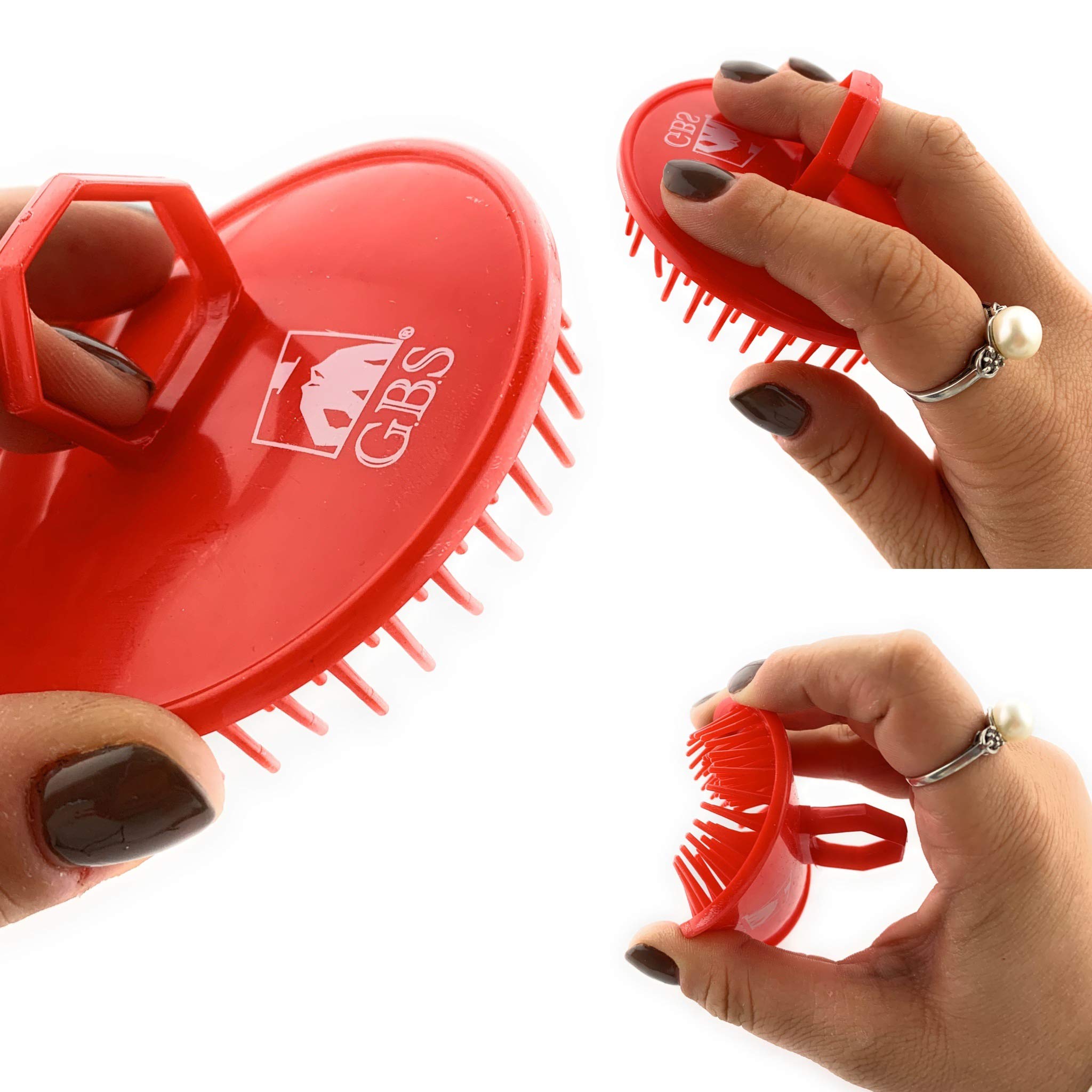 G.B.S pocket-friendly scalp brush held in hand.