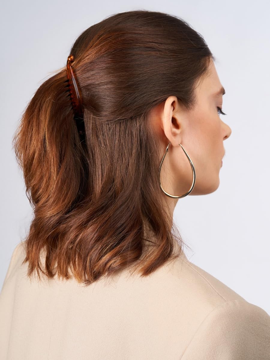 Vintage fishtail design detail on banana clips