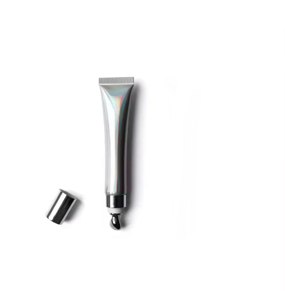 Generic Extreme Lip Plumper bottle with clear gloss for instant volume.