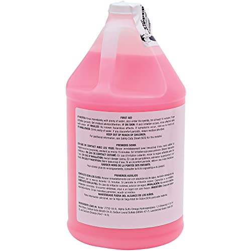 Manos cubiertas por espuma cremosa con jabón loción rosa Genuine Joe