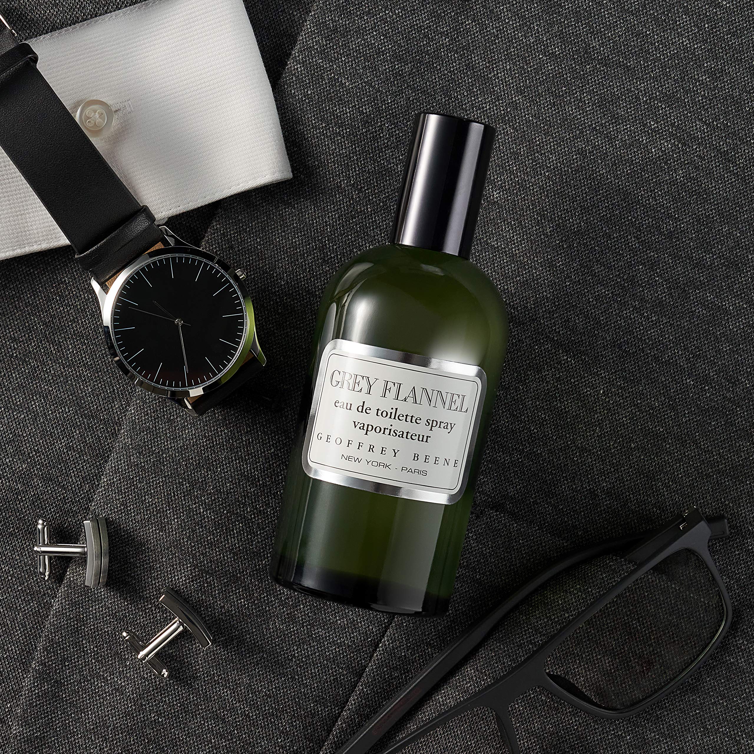 Geoffrey Beene Grey Flannel bottle with orange and lemon notes, refreshing daytime vibe.