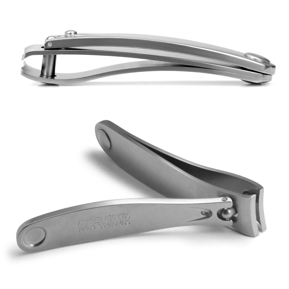 GERMANIKURE 9 mm jaw demonstrated for clean cuts on standard nails.