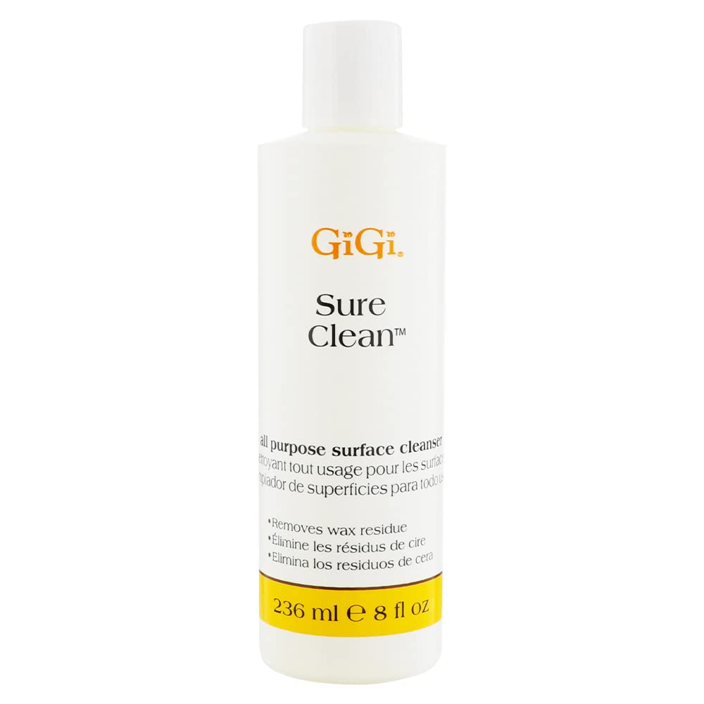 GIGI Sure Clean Wax Remover bottle pour demonstrates quick residue lifting for efficient cleanup.