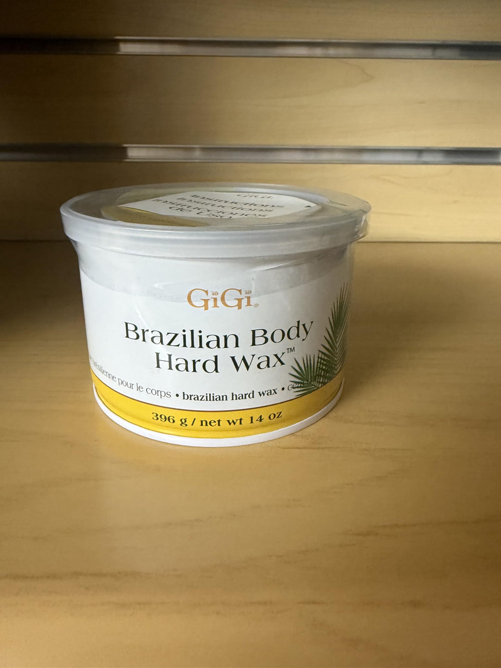 GIGI wax packaging features a plastic lid for mess-free storage.