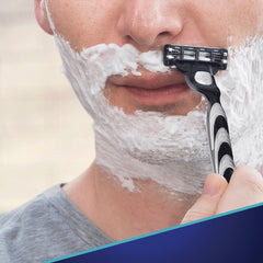 Gillette Mach3 blade refill closeup showing sharper blades for smoother results.