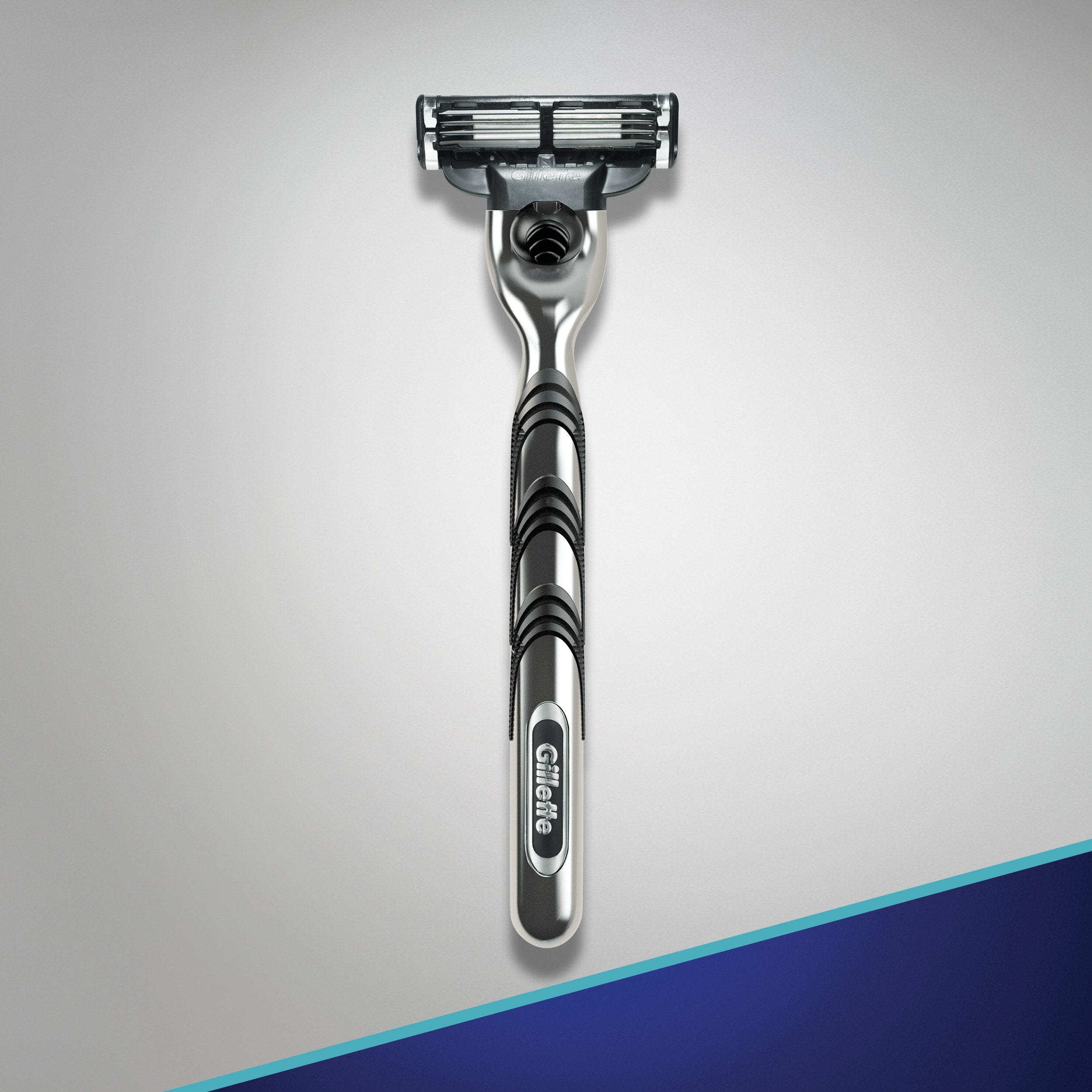 Gillette Mach3 skin guard stretch closeup helping prep hair for cutting.