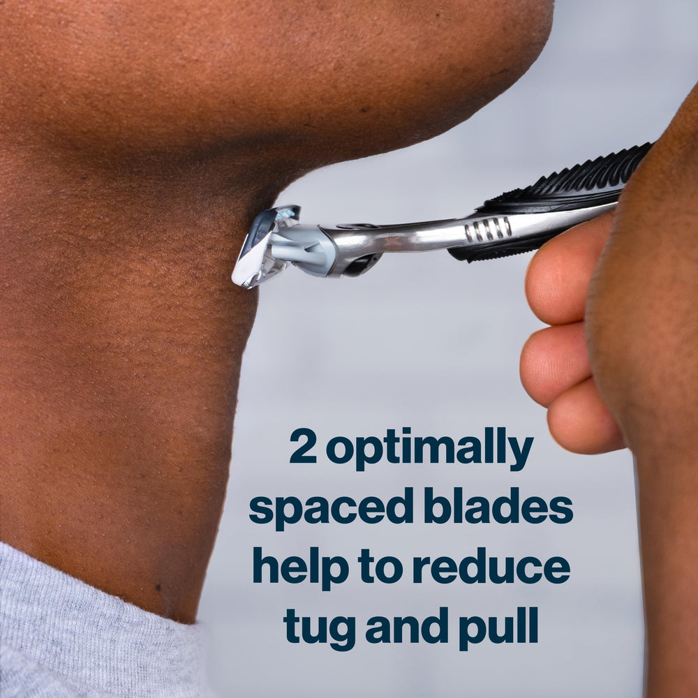 Gillette SkinGuard between-blades design protects skin while enabling close cutting.