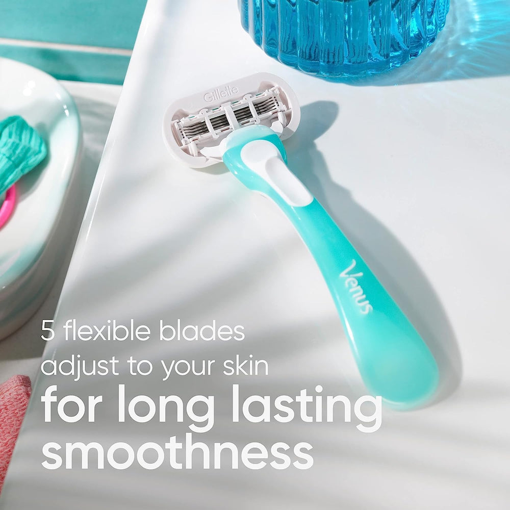 Gillette Venus disposable razor pack open, ready to toss.