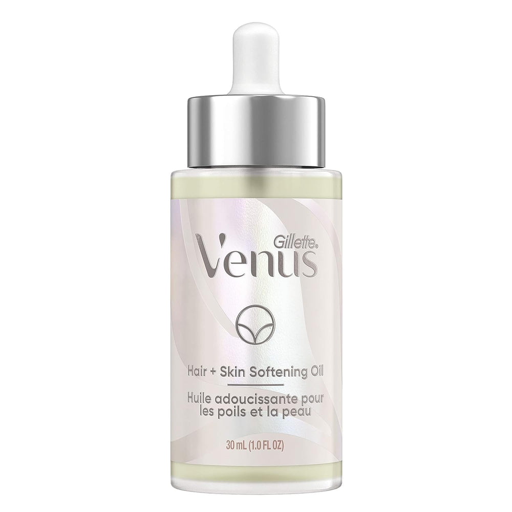 Gillette Venus Softening Oil bottle on bathroom counter for skin hydration