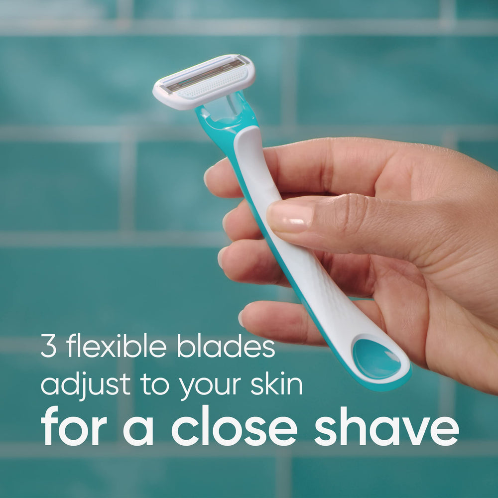 Gillette Venus Tropical pivot head reaching curves during shaving.