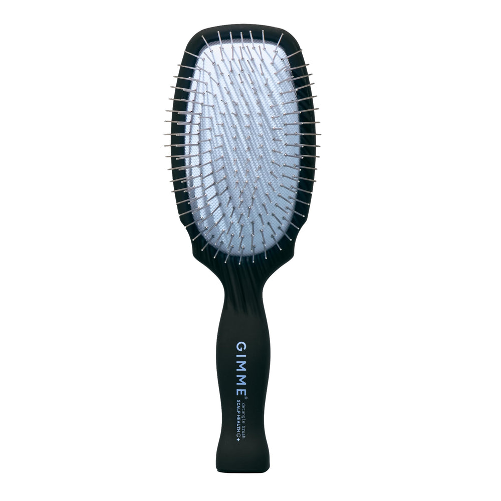 GIMME Beauty Metal Bristle Brush with stainless steel bristles detangles smoothly.