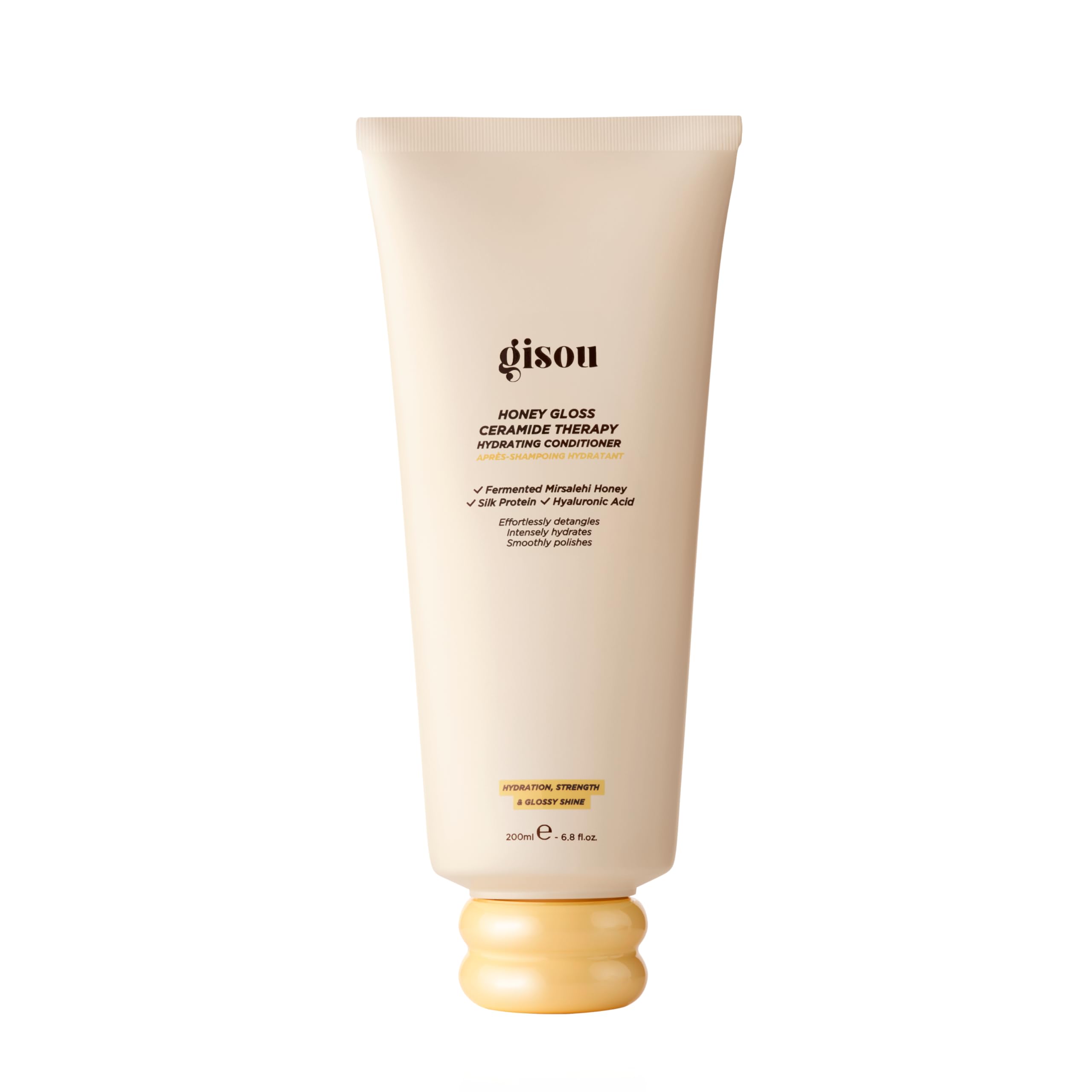 Gisou Honey Gloss Ceramide Therapy Conditioner bottle close-up showing hydration and shine.
