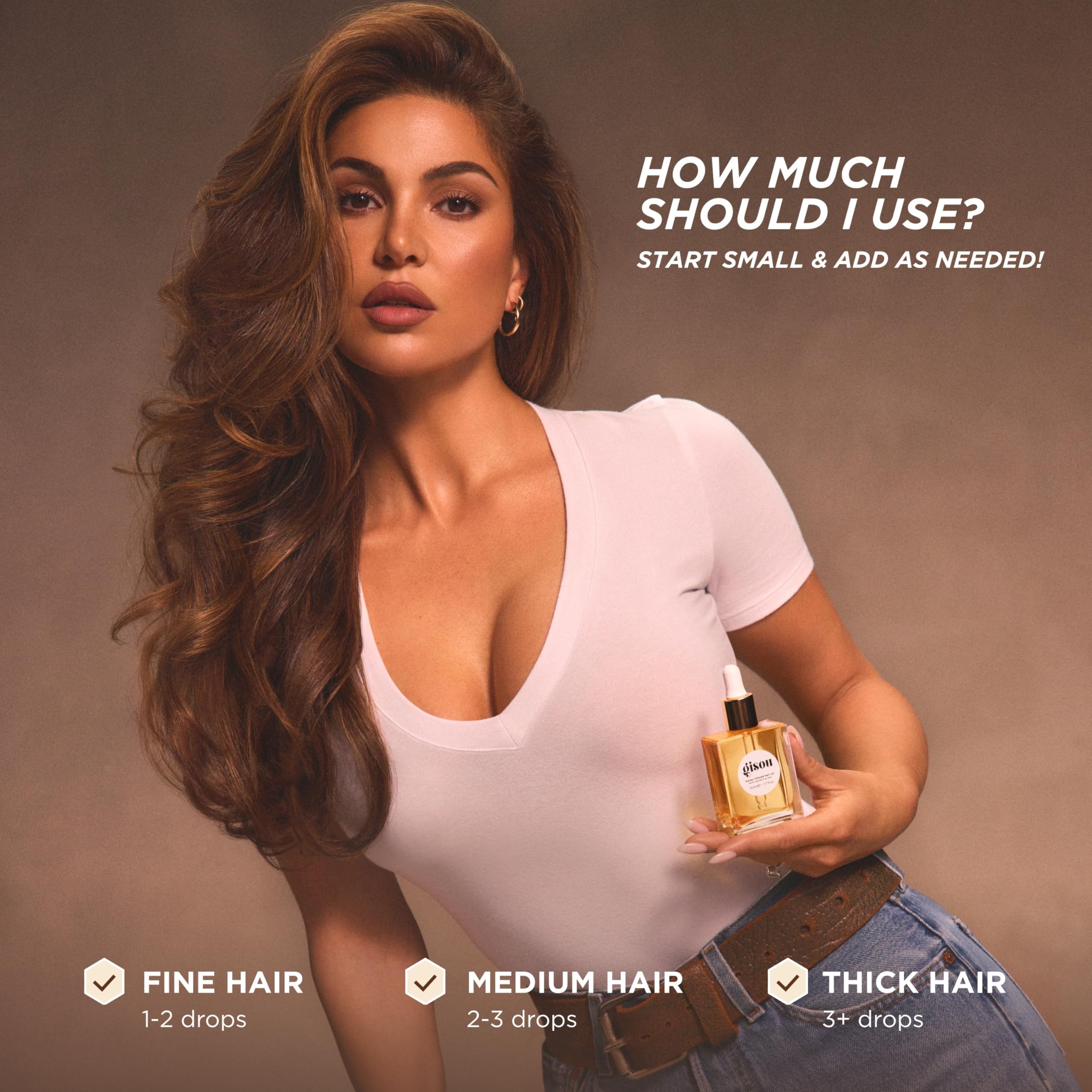 Gisou Honey Infused Hair Oil Mini drop application highlights quick styling prep.