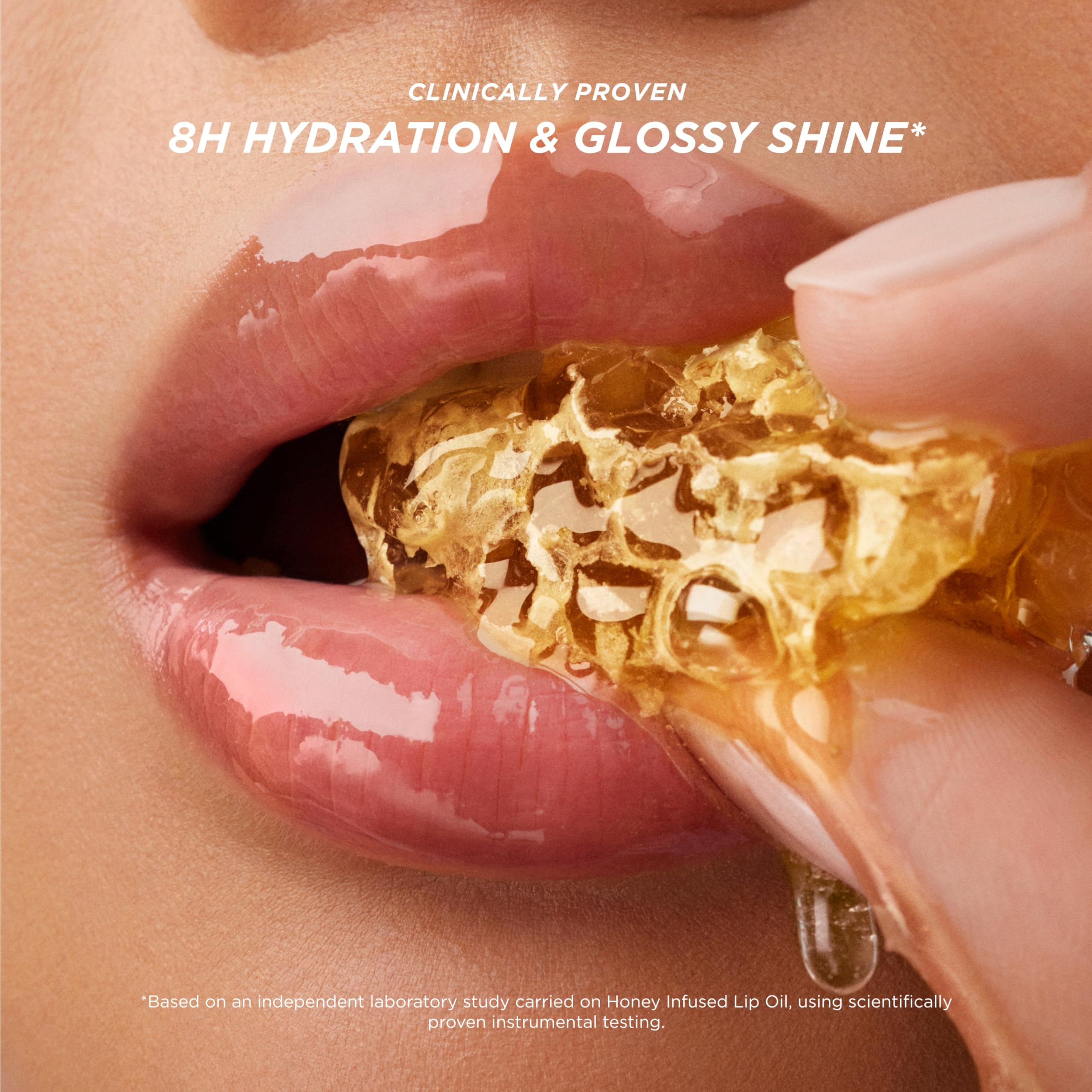 Gisou Honey Infused Lip Oil 8 ml bottle for on-the-go hydration.