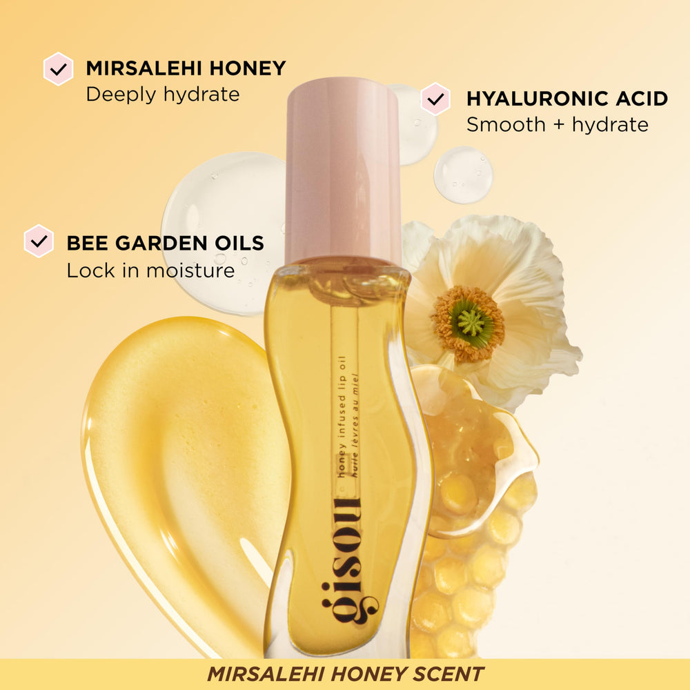 Gisou Honey Infused Lip Oil applicator ready for layering.