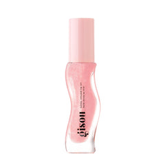 Gisou Honey Infused Lip Oil bottle close-up for intense hydration and glossy shine.