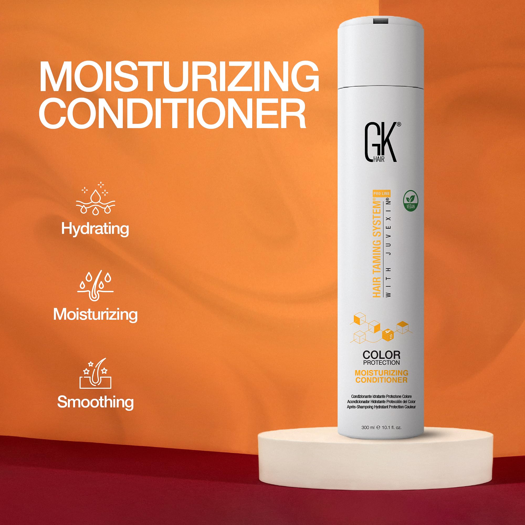 GK HAIR Hydrate conditioner color-treated hair application on strands.