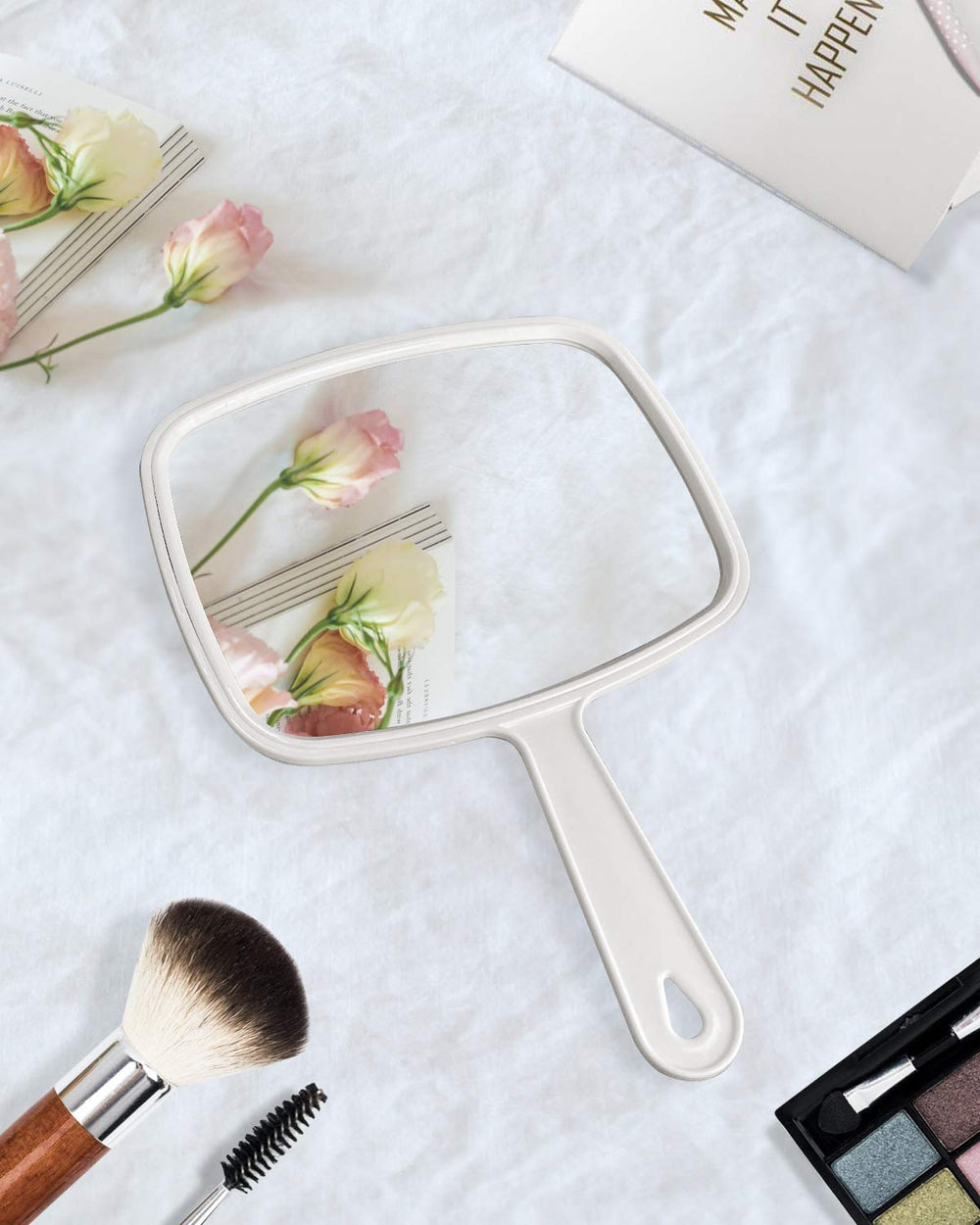 Gladmart portable hand mirror ideal for quick grooming on the go.