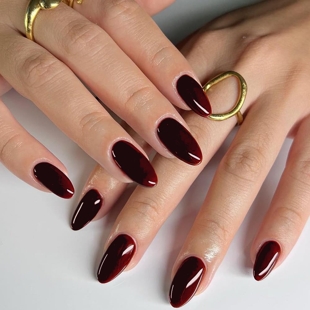 Glamermaid dark red nails close-up with jelly-soft gel finish.