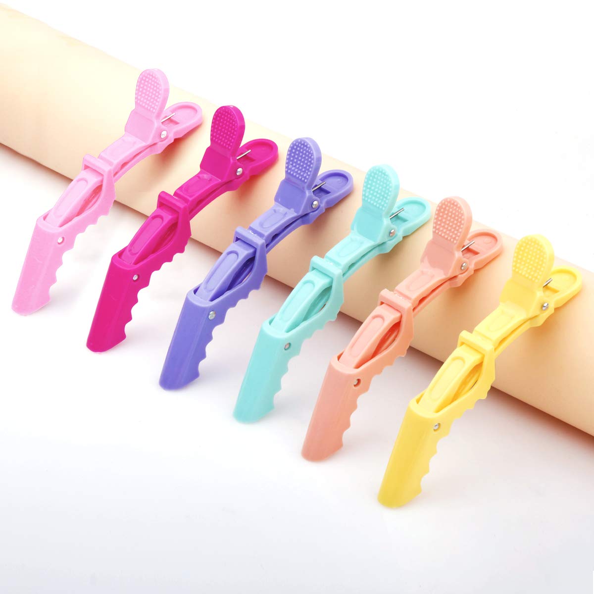 GLAMFIELDS pinzas cocodrilo diseño curvado para adaptar al contorno.