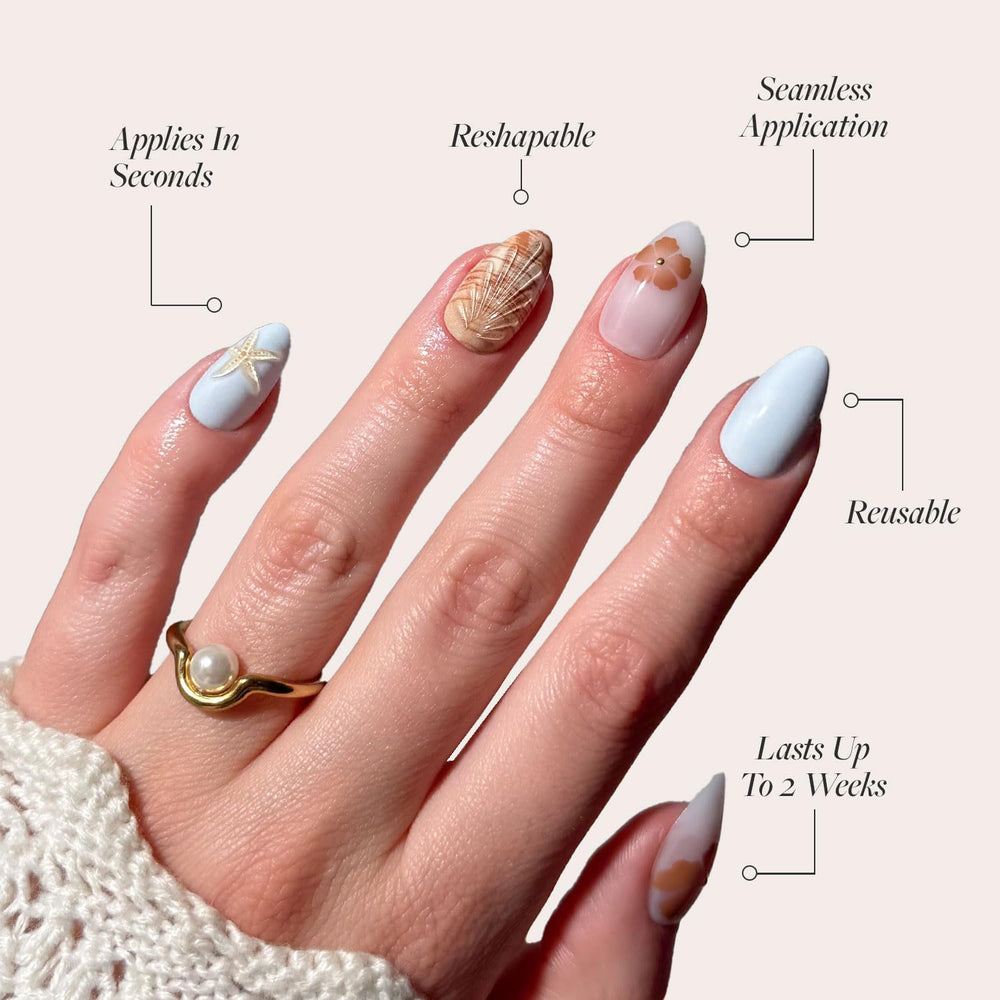 Glamnetic Estrella Marina: uñas almendra cortas, acabado con brillo.
