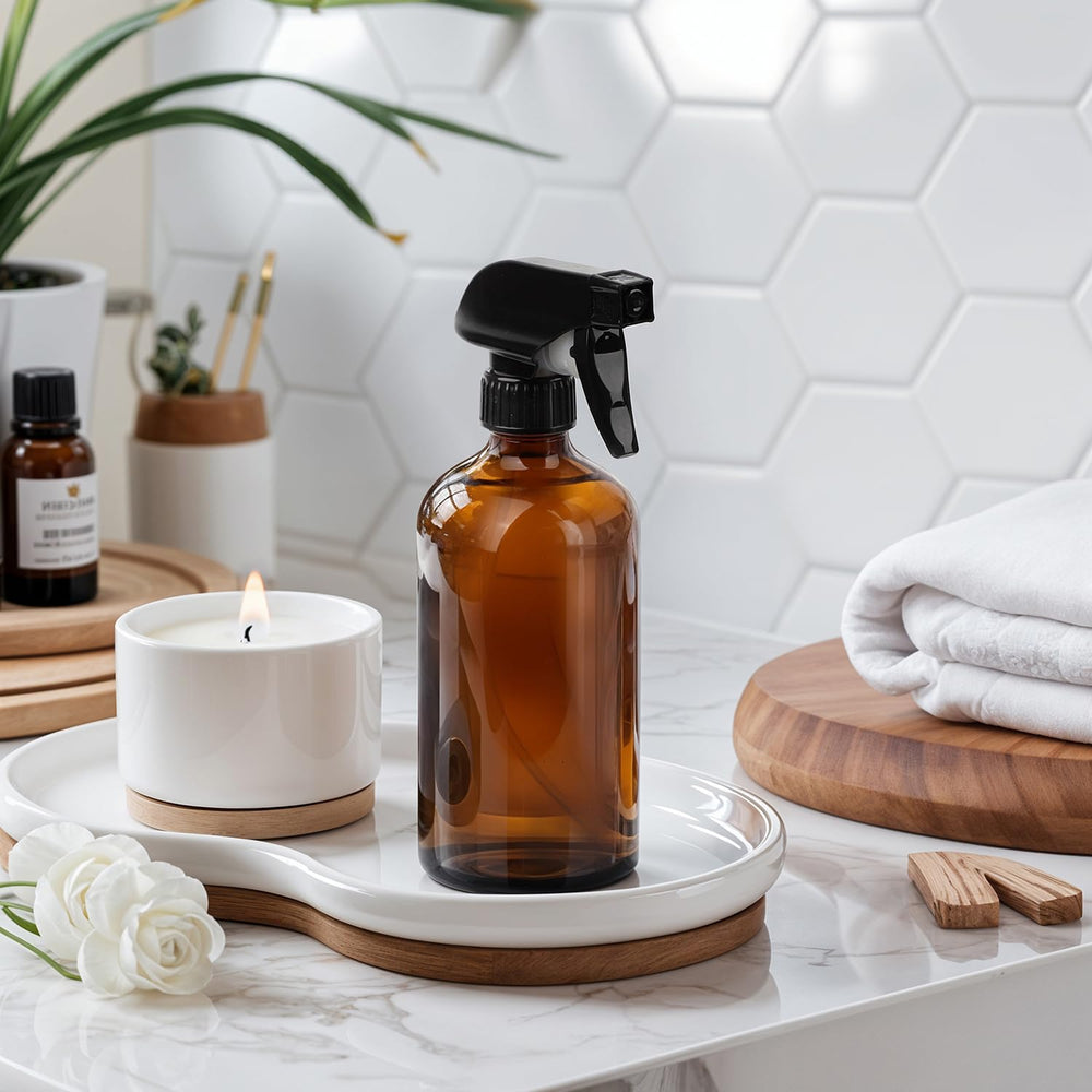 GLING two-pack amber glass spray bottles on a clean counter.