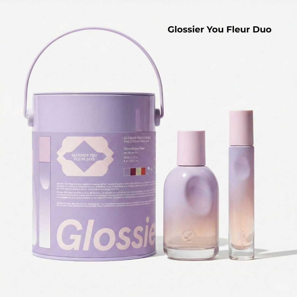 Glossier You Fleur bottle side view showing the thumbprint indent and tactile luxe.