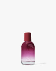 Glossier You Reve bottle with thumbprint indent, highlighting personalized fragrance.