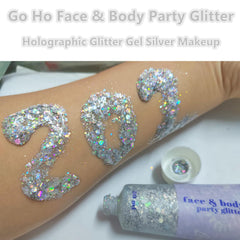 Go Ho Silver glitter on the face for a festival-ready glow.