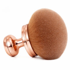 GOERTI extra-large self-tanner brush head for smooth, even body blends.