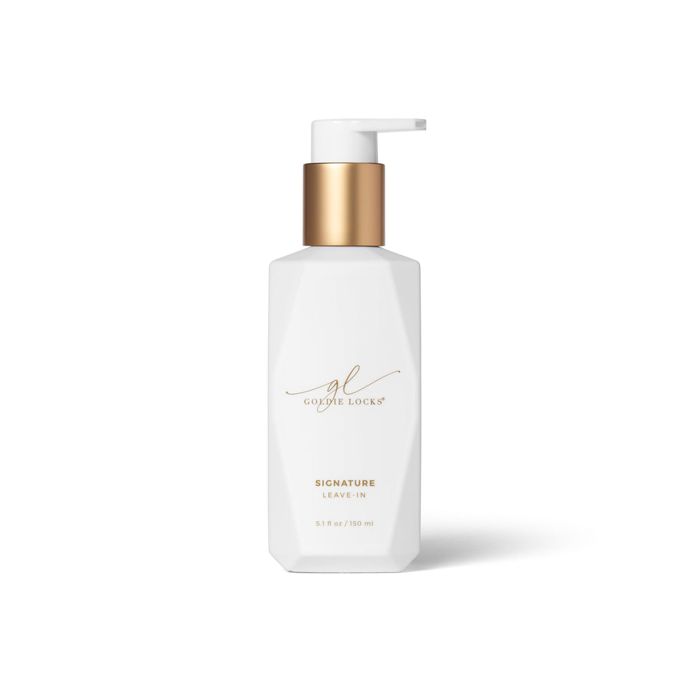 Goldie Locks Signature Leave-In Conditioner bottle pour for quick detangling and hydration.