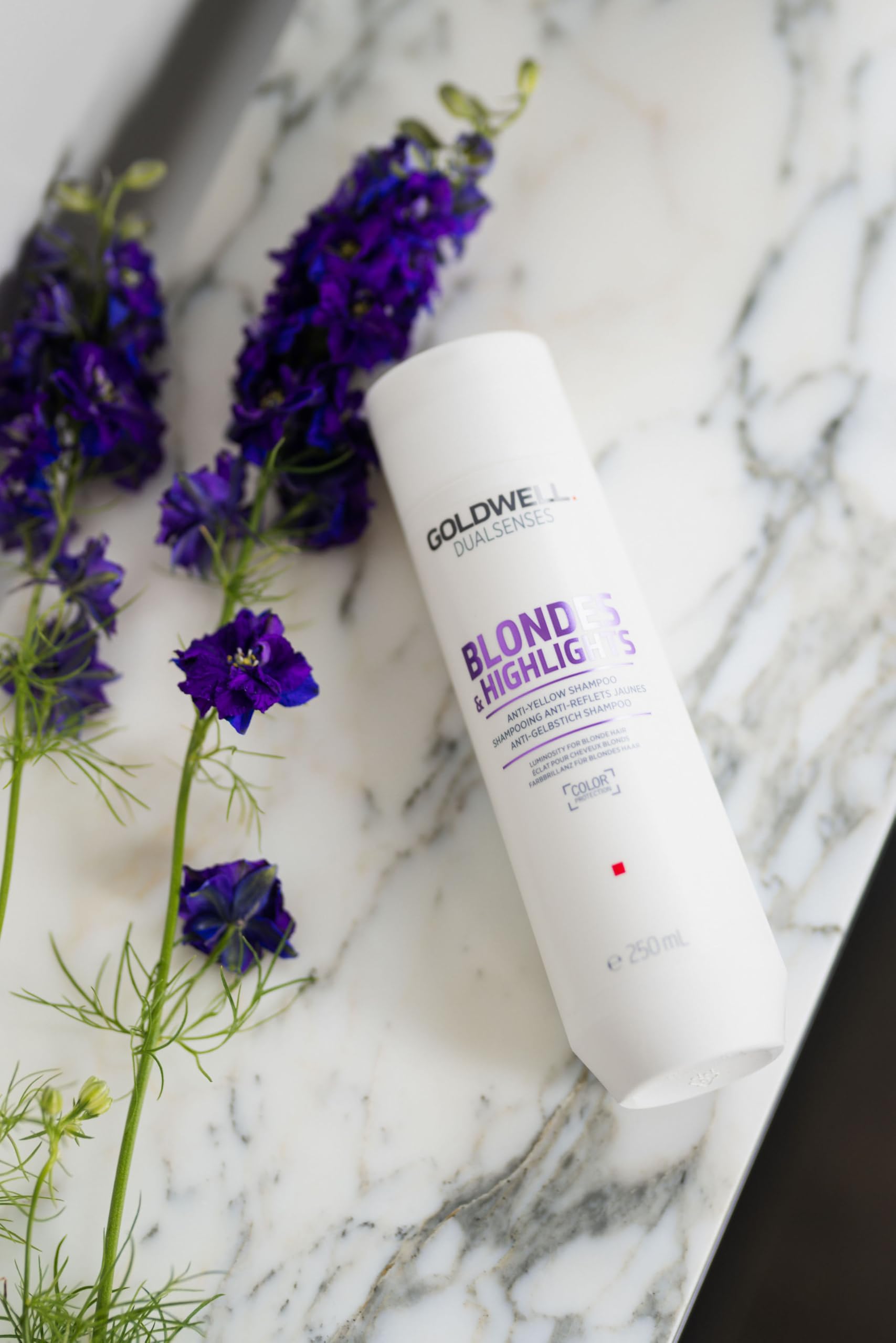 Goldwell FadeStop formula on sleek bottle promises color retention